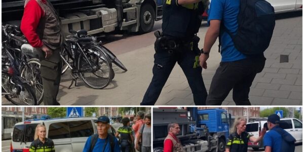 Politieagente controleert de realiteit van koppige vluchtelingen en geeft ze midden op straat een klap in het gezicht.