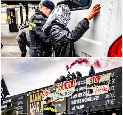 Demonstranten aangehouden na beklimmen agendabord en gooien van verfbommen bij Ahoy