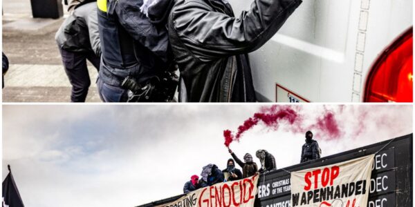 Demonstranten aangehouden na beklimmen agendabord en gooien van verfbommen bij Ahoy