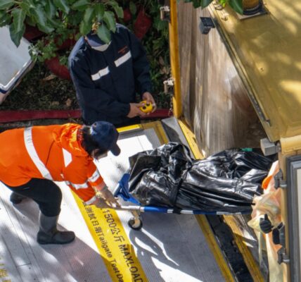 Hong Kong police arrest 8 people as fire death toll rises to 128