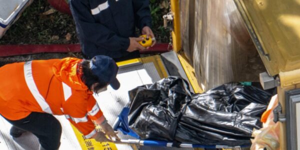 Hong Kong police arrest 8 people as fire death toll rises to 128